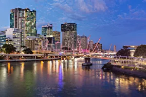 Brisbane City Skyline at sunset with all the building lights Brisbane City Skyline at sunset with all the building lights