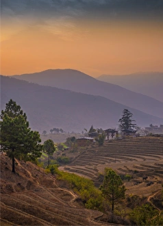 A dawn sky lights up the Punakha valley in Bhutan A dawn sky lights up the Punakha valley in Bhutan