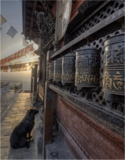 Dawn at Swayambunath temple and Prayer wheels used in worship, Western Himalayas, Nepal Dawn at Swayambunath temple and Prayer wheels used in worship, Western Himalayas, Nepal