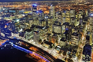 Elevated view of the Centre and docklands illuminated at night Elevated view of the Centre and docklands illuminated at night