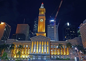 Facade of Brisbanes City hall illuminated at night Facade of Brisbanes City hall illuminated at night