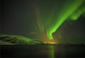 Lauklinnes in winter and the Aurora Borealis, arctic circle of Norway Lauklinnes in winter and the Aurora Borealis, arctic circle of Norway