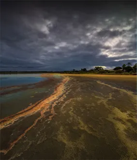 Low tide during stormy weather at a Salt lagoon near Indented head, Bellarine Peninsula Low tide during stormy weather at a Salt lagoon near Indented head, Bellarine Peninsula