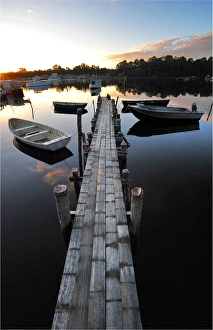 Old pier at Strahan, in the south west of the island state, Tasmania, Australia Old pier at Strahan, in the south west of the island state, Tasmania, Australia