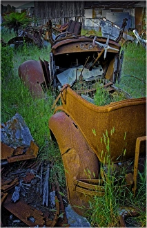 Old vehicles rusting away at Badgers corner, Flinders Island, Bass Strait, Tasmania, Australia Old vehicles rusting away at Badgers corner, Flinders Island, Bass Strait, Tasmania, Australia