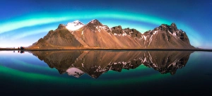 Panoramic view of Aurora Borealis Over Vestrahorn Mountains Panoramic view of Aurora Borealis Over Vestrahorn Mountains