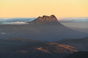 Precipitous Bluff rising above Southwest Tasmania at sunset viewed from Mt Geeves Precipitous Bluff rising above Southwest Tasmania at sunset viewed from Mt Geeves
