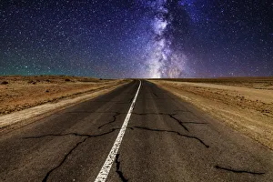 Road in the desert at night with the Milky Way Road in the desert at night with the Milky Way