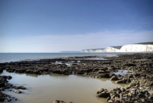 Seven Sisters white cliffs rocky beach at low tide Seven Sisters white cliffs rocky beach at low tide