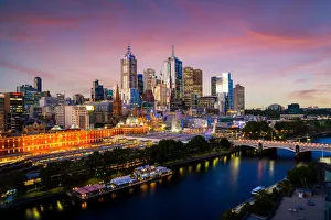 Sunset over city skyline of Melbourne downtown, Princess Bridge Sunset over city skyline of Melbourne downtown, Princess Bridge