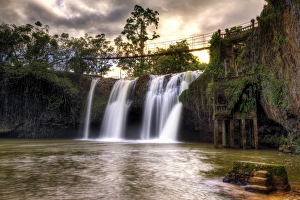 Sunset at Mena Creek Falls Near Innisfail, Far North Queensland, Australia Sunset at Mena Creek Falls Near Innisfail, Far North Queensland, Australia