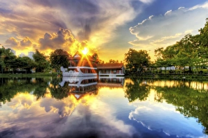 Sunset with the Traditional Style Stone Boat and Tea House in Singapore Chinese Garden Sunset with the Traditional Style Stone Boat and Tea House in Singapore Chinese Garden
