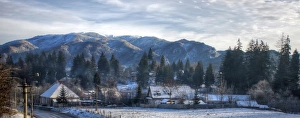 Transylvanian Alps and small village in winter Transylvanian Alps and small village in winter