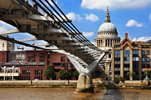 View of St Pauls Cathedral and the Millennium Bridge at River Thames, London, England View of St Pauls Cathedral and the Millennium Bridge at River Thames, London, England