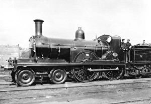 Driver and fireman in the cab of a 4-4-0 locomotive number 421 on the North British Driver and fireman in the cab of a 4-4-0 locomotive number 421 on the North British