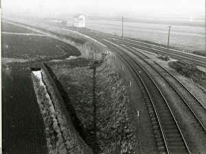 Ely West Junction signal box stands on the Ely to March mainline, a refuge siding Ely West Junction signal box stands on the Ely to March mainline, a refuge siding