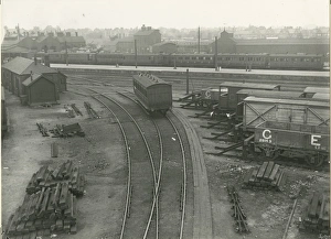 View of north end of station platform, with locomotive running shed in background View of north end of station platform, with locomotive running shed in background