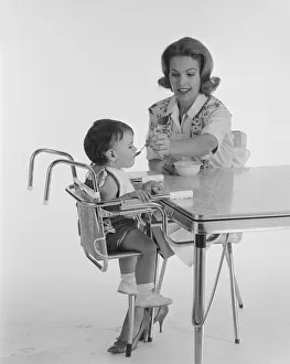 1960, Two People, Adult, Baby, Young Adult, Young Women, Baby Boys, Caucasian Appearance 1960, Two People, Adult, Baby, Young Adult, Young Women, Baby Boys, Caucasian Appearance