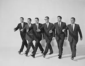 1960s Businessmen Extending Hand to Shake 1960s Businessmen Extending Hand to Shake