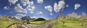 360 panoramic view of the Geisler Mountains, two hikers walking near Mittagsscharte gorge 360 panoramic view of the Geisler Mountains, two hikers walking near Mittagsscharte gorge