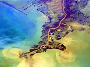 Aerial of flooding river discharging eroded soil, silt and other sediments into the Java Aerial of flooding river discharging eroded soil, silt and other sediments into the Java