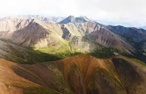 Aerial of mineral-rich Northern Mackenzie Mountains, Peel Watershed, Yukon Territory Aerial of mineral-rich Northern Mackenzie Mountains, Peel Watershed, Yukon Territory