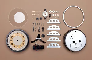 Alarm clock broken down into individual parts Alarm clock broken down into individual parts