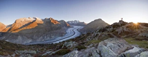 Aletsch Glacier at first morning light with photographer, from Moosfluh, Riederalp Aletsch Glacier at first morning light with photographer, from Moosfluh, Riederalp