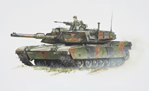 American M1 Abrams army tank with soldier in the hatch by machine gun American M1 Abrams army tank with soldier in the hatch by machine gun