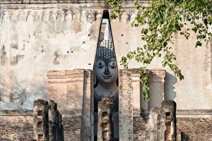 Ancient big buddha statue in Wat Si Chum temple at Sukhothai Historical Park Ancient big buddha statue in Wat Si Chum temple at Sukhothai Historical Park