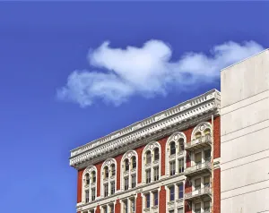 Modern Architecture Images Prints: Cloud Over Bricks