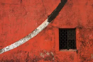 Prints of red textured wall with a window at jantar mantar delhi. it's an fine art photographic image i captured at jantar mantar delhi Architecture Prints: Red Wall with Window Print at Jantar Mantar Delhi