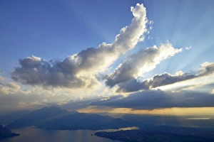 Atmospheric clouds above Lake Lucerne, Mount Pilatus at back, Vitznau, Canton of Schwyz, Switzerland Atmospheric clouds above Lake Lucerne, Mount Pilatus at back, Vitznau, Canton of Schwyz, Switzerland