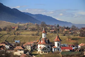 Autumn landscape of village and mountain range in background, Campulung Moldovenesc, Suceava County, Bucovina Autumn landscape of village and mountain range in background, Campulung Moldovenesc, Suceava County, Bucovina