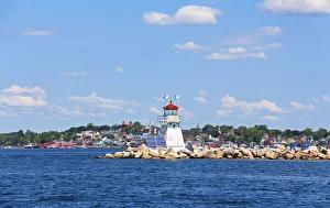 Battery Point Breakwater Lighthouse with Lunenburg in the background -Nova Scotia Battery Point Breakwater Lighthouse with Lunenburg in the background -Nova Scotia