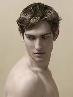 Beauty portrait of a young man with moving hair Beauty portrait of a young man with moving hair