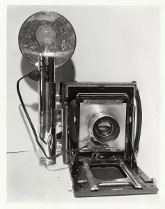 Vintage Photography Equipment Prints: Camera with Flash Attached
