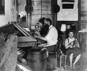 Jacob Riis Photography Prints: Cigar Maker at Work