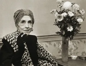 Prints of (Original Caption) 1/3/1959-Copenhagen, Denmark- World-famed Danish authoress Countess Karen Blixen, better known under her pen nmae of Isak Dinesen Denmark Prints: Countess Karen Blixen Relaxes with Cigarette Print, 1/3/1959