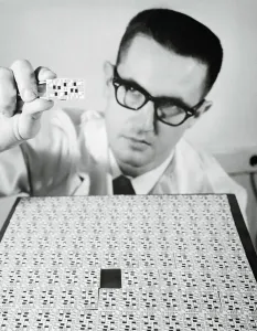 Electronic Components Prints: Engineer Inspecting Chip