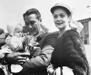 London Airport Arrivals Prints: Errol Flynn with Wife and Daughter