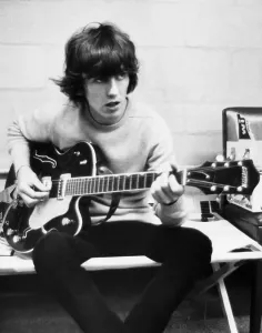 Prints of Guitarist George Harrison of The Beatles rehearsing, circa 1967 Music Prints: George Harrison Playing Guitar Print, 1967