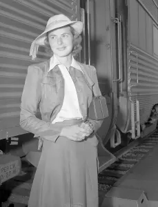 Ingrid Bergman Prints: Ingrid Bergman Posing Beside Train