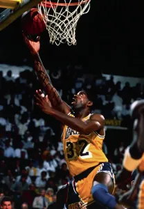 Basketball Player Prints: Magic Johnson Going for Basket