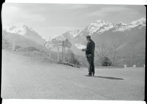 French Mountain Landscape Prints: Man Looking at Roadmap at Intersection