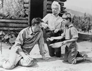 River of No Return Print: Marilyn Monroe and Robert Mitchum