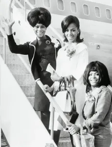London Airport Arrivals Prints: The Marvelettes Waving from Airplane Steps