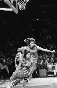 Prints of Chicago Hustle's (15). Rita Gail Easterling brought the ball around in front of Milwaukee Does (1). Joanie Smith during the Hustle-Does game Rita Prints: Women's Pro Basketball League Print: 1978 Game