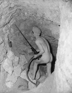 Historic Mining Equipment Prints: A Miner Using a Drill