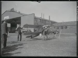 Pilot Posing with His Plane Print